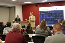 Dennis Bacon, Huntsville Center Fuels Branch chief, speaking at the 2025 Fuels Safety Symposium where he emphasized the importance of continuous attentiveness and accountability.