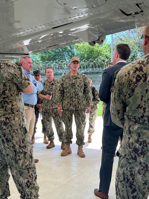 U.S. Naval Forces Southern Command / U.S. 4th Fleet Commander Rear Adm. Carlos Sardiello, center, receives an overview of the Hybrid Fleet Campaign (HFC) Fleet Experiment (FLEX) manned and unmanned systems integration field tests during the FLEX showcase event at CSL Comalapa near San Salvador, El Salvador, May 27, 2025. HFC is a learning campaign to retain and improve advantages using next-generation manned and unmanned systems, tested and integrated during and after FLEX. U.S. Naval Forces Southern Command/U.S. 4th Fleet is the maritime component of U.S. Southern Command and the trusted maritime partner for Caribbean, Central and South America maritime forces leading to improved unity, security and stability.