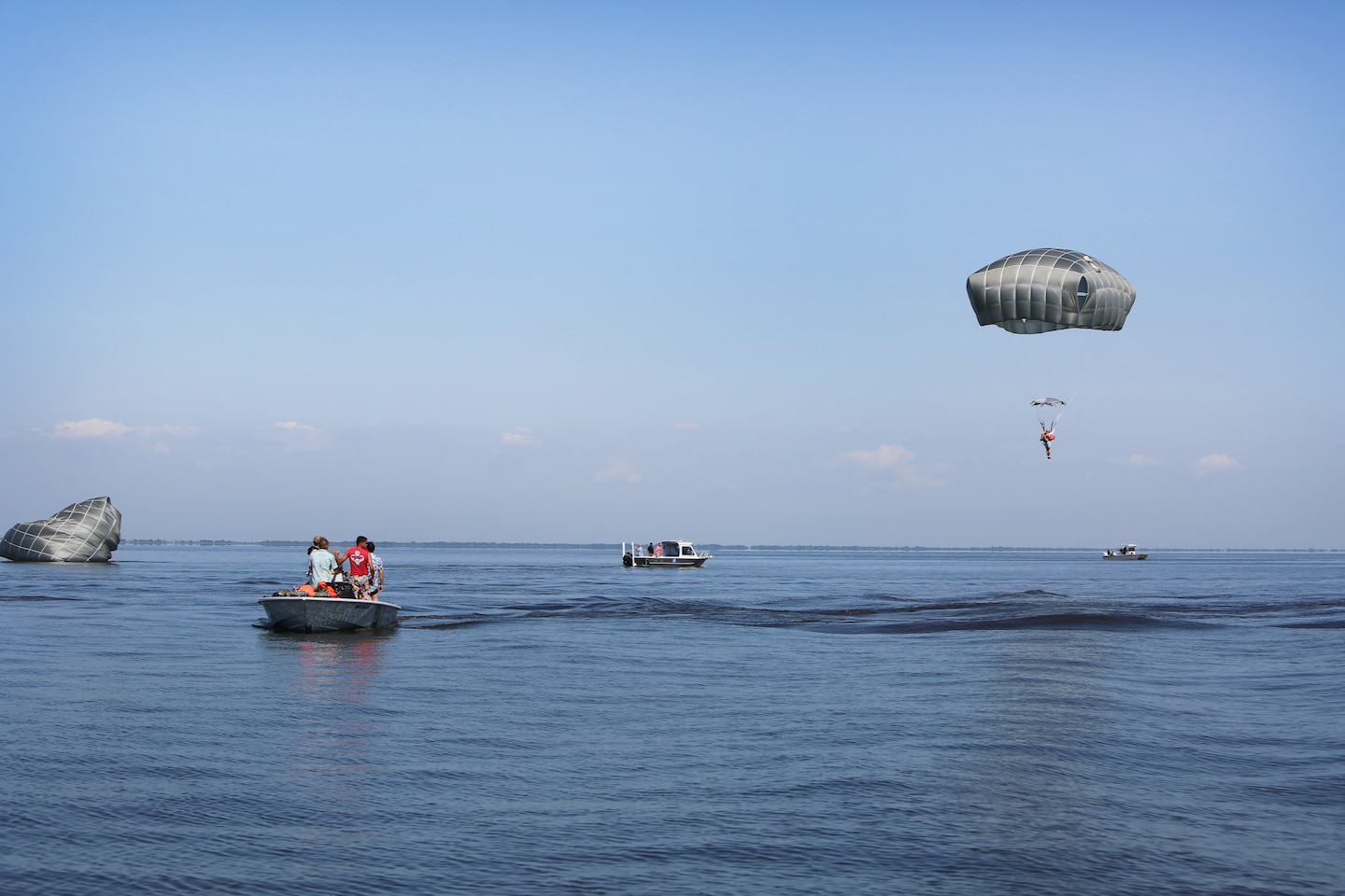 Paratroopers from the U.S. Army Reserve 478th Civil Affairs Battalion (Airborne), stationed in Miami, Fla., conducted a Deliberate Water Jump into Lake Okeechobee, May. 16.  This training event prepares the soldiers for potential water landings, maintain proficiency in water operations and highlights the unit's ability to perform airborne operations under challenging conditions and locations anywhere in the world.   (U.S. Army photo/Mark Rankin)