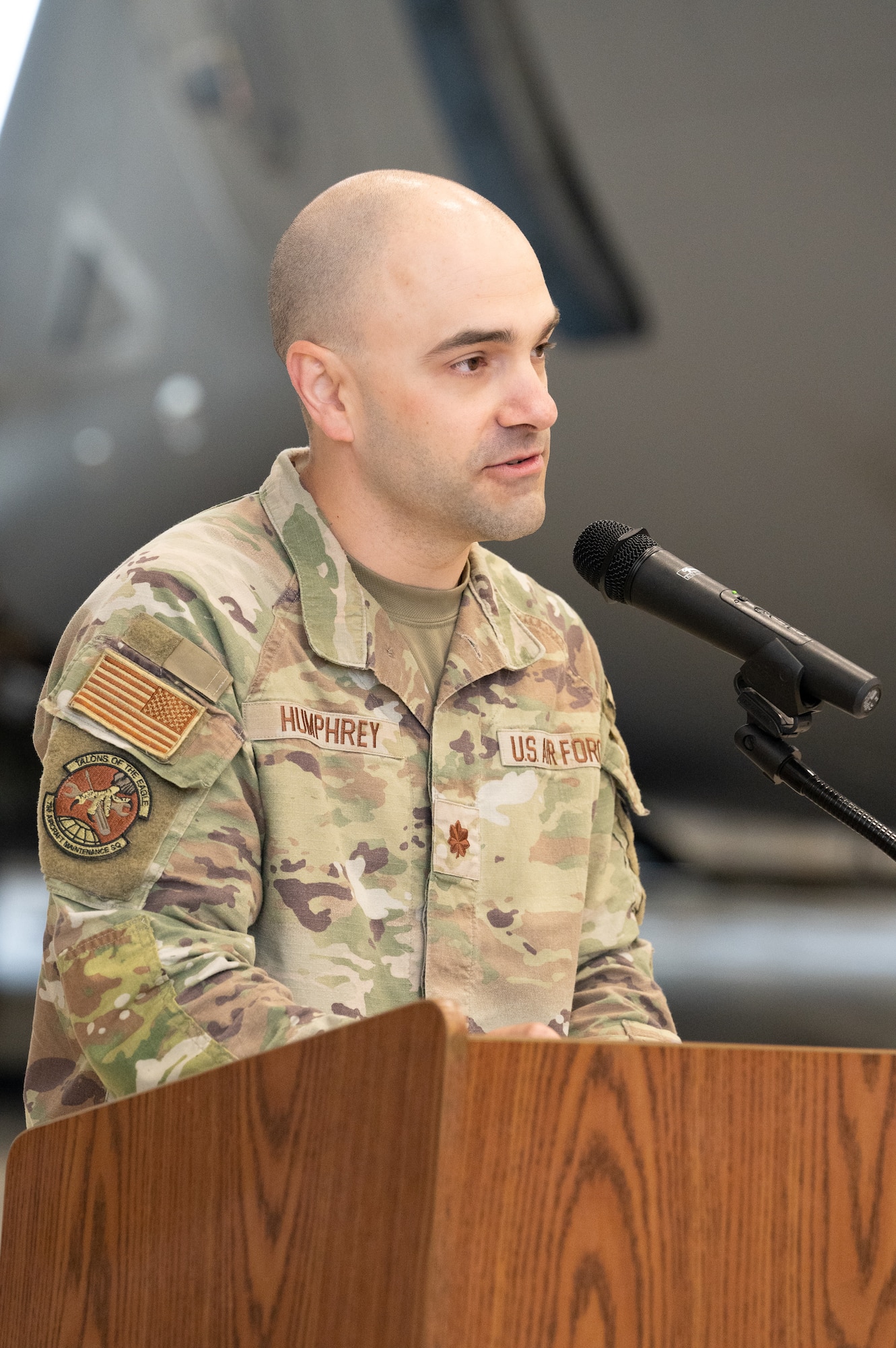 U.S. Air Force Maj. Donald Humphrey gives his first address as commander of the 736th Aircraft Maintenance Squadron, during a change of command ceremony at Dover Air Force Base, Delaware, May 28, 2025. The ceremony saw Maj. Shane Connolly relinquish command to Humphrey. (U.S. Air Force photo by Mauricio Campino)
