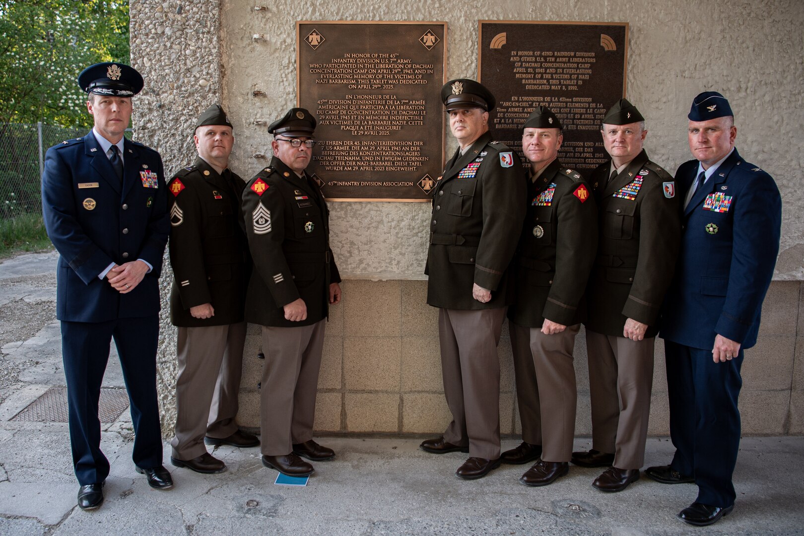 Leaders with the Oklahoma National Guard gather in front of a new plaque honoring Soldiers of the 45th Infantry Division who assisted in the liberation of the Dachau Concentration Camp in 1945 at the Dachau Concentration Camp Memorial Site in Dachau, Germany, April 29, 2025. The Oklahoma National Guard members helped dedicate a newly placed plaque honoring the Soldiers of the 45th Infantry Division for their role in liberating the camp on the 80th anniversary of the camp’s liberation. (Oklahoma National Guard Photo by Staff Sgt. Anthony Jones)