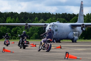 Motorcycles go through a circuit.