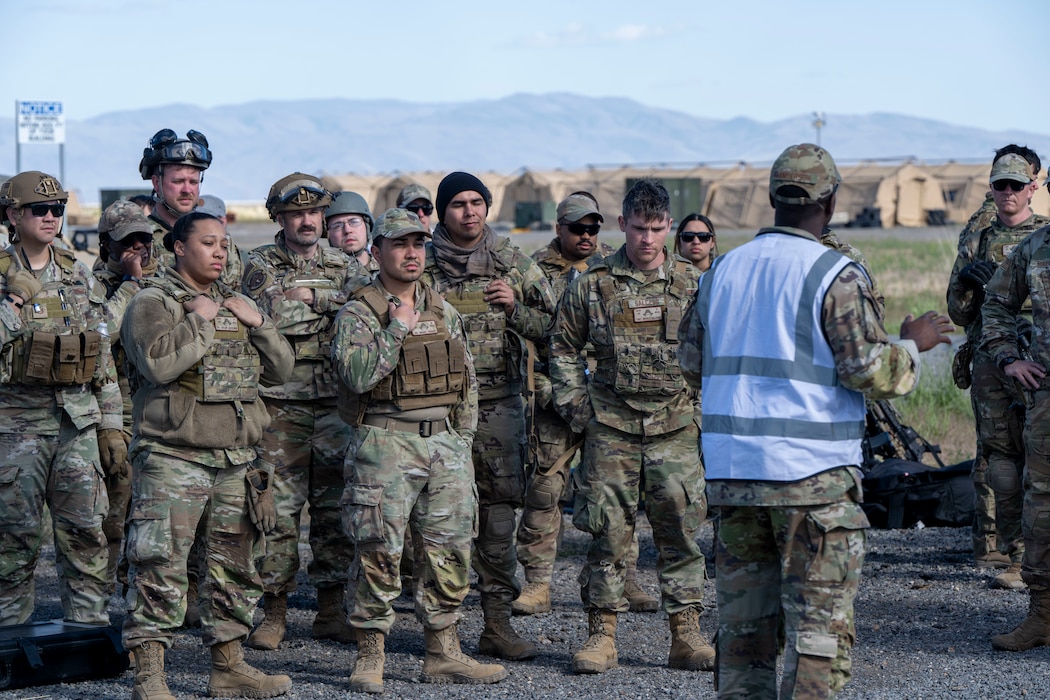 Airmen listen to speaker