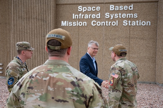  Secretary of the Air Force Troy Meink engages with U.S. Space Force Guardians assigned to Mission Delta 4 (Missile Warning) at Schriever Space Force Base, Colorado, May 28, 2025. Space Operations Command Guardians and Airmen demonstrated their combat readiness and warrior ethos, providing Meink with a deep dive into multiple critical mission areas, to include Space Domain Awareness; Electromagnetic Warfare; Missile Warning; Intelligence, Surveillance, Reconnaissance and Targeting; Orbital Warfare and Positioning, Navigation and Timing; as well as the critical mission support provided by the U.S. Air Force.  (U.S. Space Force photo by Dave Grim)