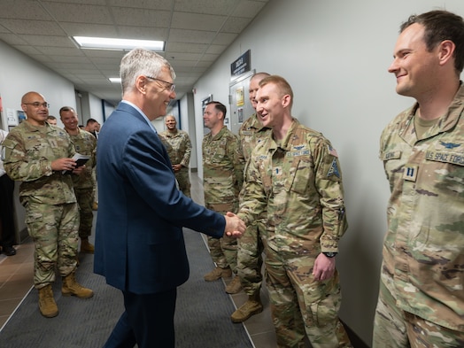 Secretary of the Air Force Troy Meink recognizes U.S. Space Force Guardians from Mission Delta 31 (Positioning, Navigation and Timing) at Schriever Space Force Base, Colorado, May 28, 2025. Space Operations Command Guardians and Airmen demonstrated their combat readiness and warrior ethos, providing Meink with a deep dive into multiple critical mission areas, to include Space Domain Awareness; Electromagnetic Warfare; Missile Warning; Intelligence, Surveillance, Reconnaissance and Targeting; Orbital Warfare and Positioning, Navigation and Timing; as well as the critical mission support provided by the U.S. Air Force.  (U.S. Space Force photo by Dave Grim)