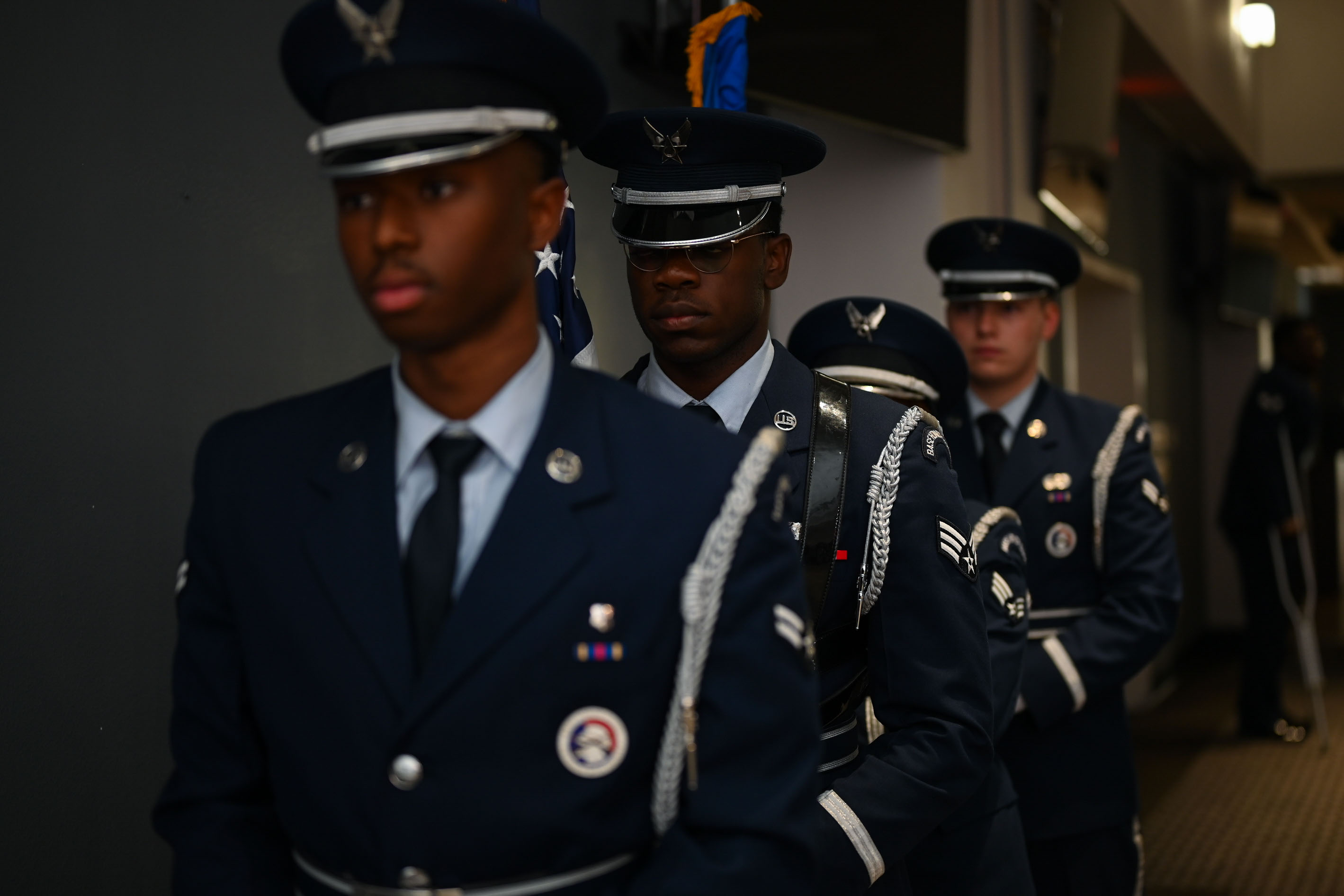 The Goodfellow Air Force Base Honor Guard prepares to present the colors during the Airman Leadership School Class 25-D Graduation Ceremony at the Powell Event Center, Goodfellow Air Force Base, Texas, May 22, 2025. One of the purposes of the Honor Guard is to present the National Colors during official ceremonies. (U.S. Air Force photo by Senior Airman Evelyn J. D’Errico)