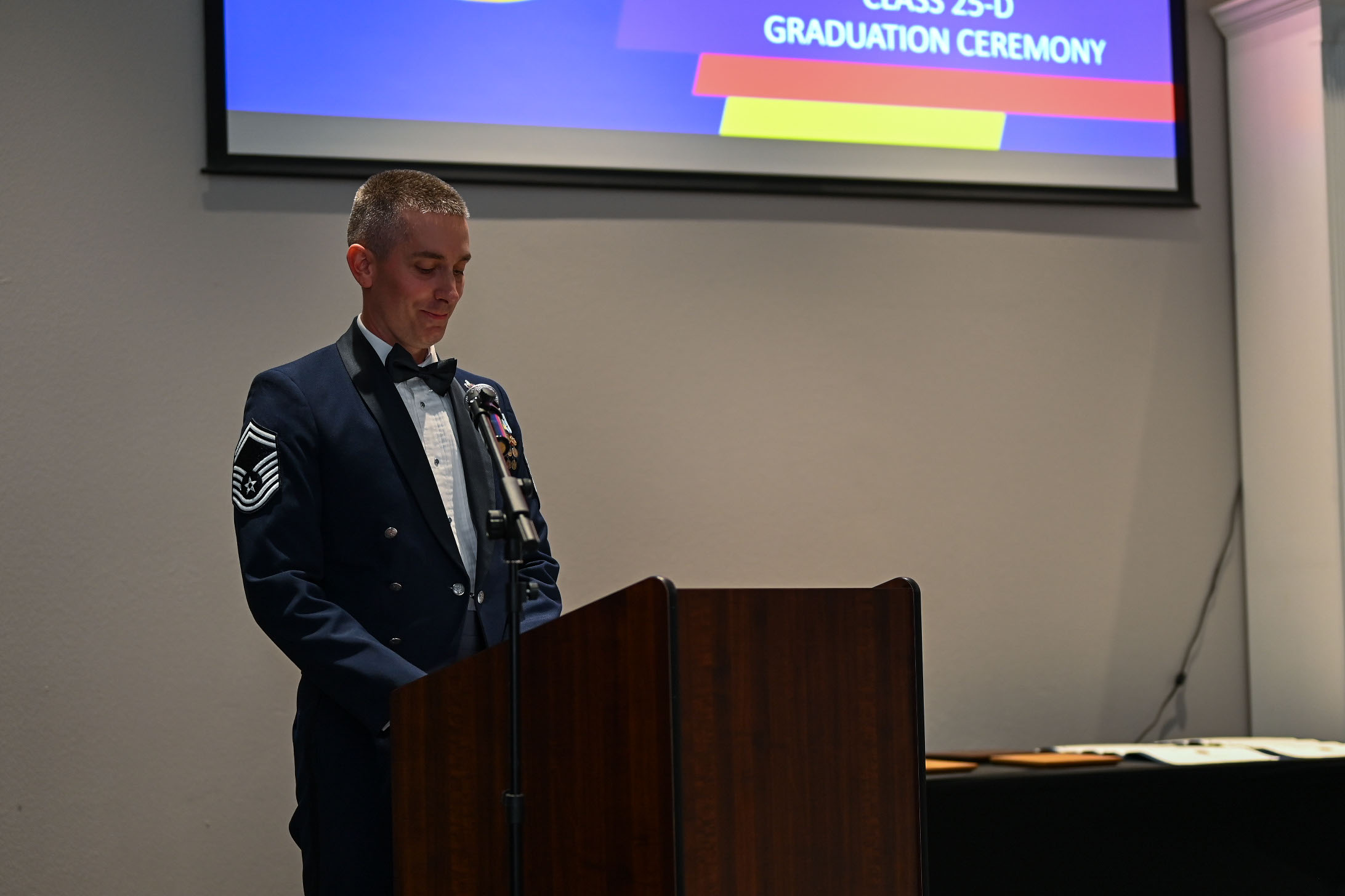 U.S. Air Force Senior Master Sgt. Bradford Schroeder, 315th Training Squadron operations superintendent, gives a speech on leadership during the ALS Class 25-B graduation at the Powell Event Center, Goodfellow Air Force Base, Texas, May 22, 2025. ALS equips Airmen with the skills to lead and manage in dynamic, complex and uncertain environments. (U.S. Air Force photo by Senior Airman Evelyn J. D’Errico)