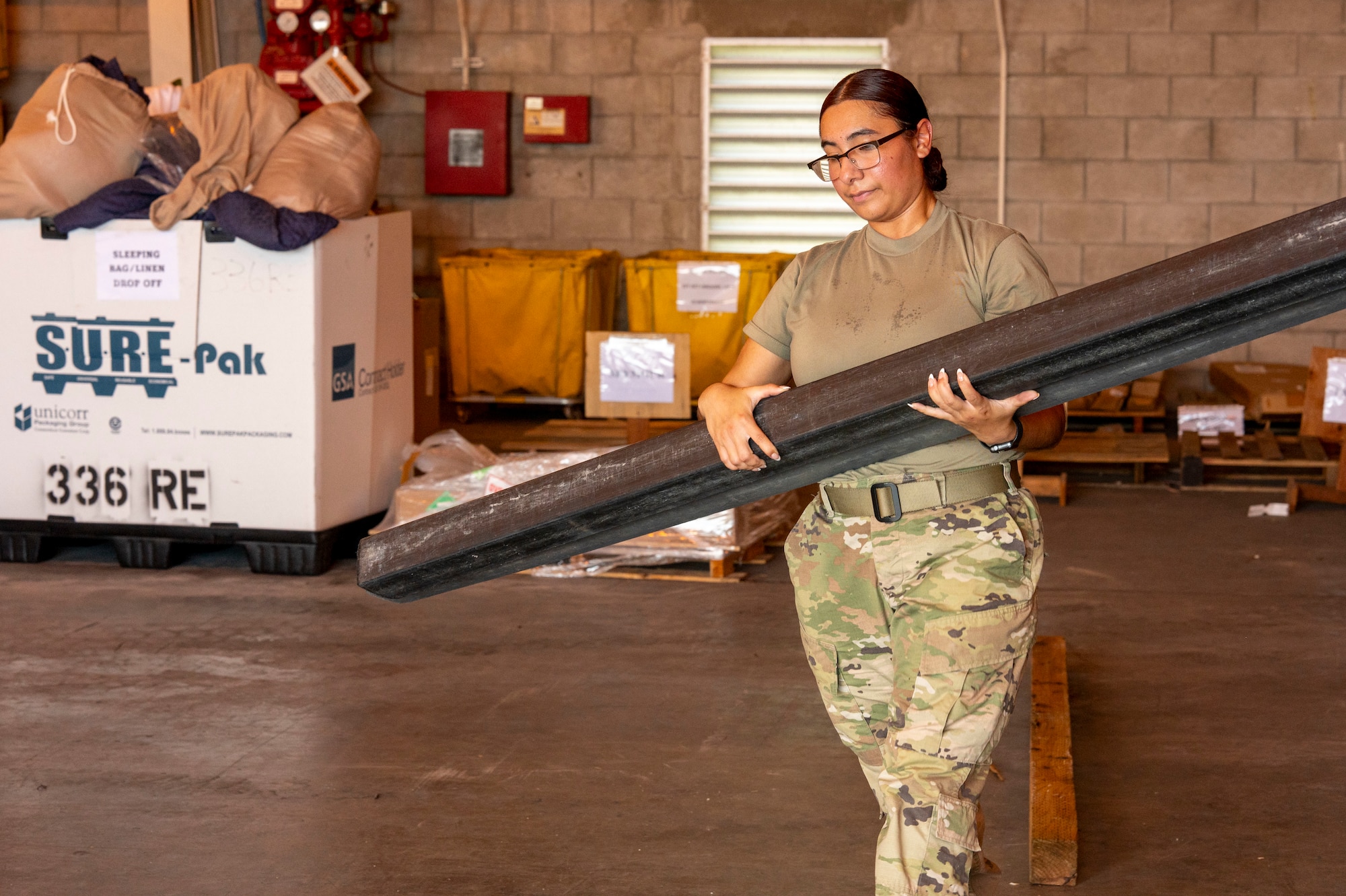 Staff Sgt. Natalie Camacho, 36th Mission Support Group Det.1 Material Management NCOIC, moves supply out of a warehouse at Diego Garcia, British Indian Ocean Territory, May 16, 2025.
