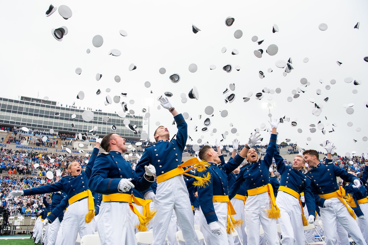 Hundreds of cadets toss their caps at graduation.