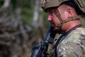 Photo of an Airman completing a simulated dismounted detection during an advanced combat skills assessment