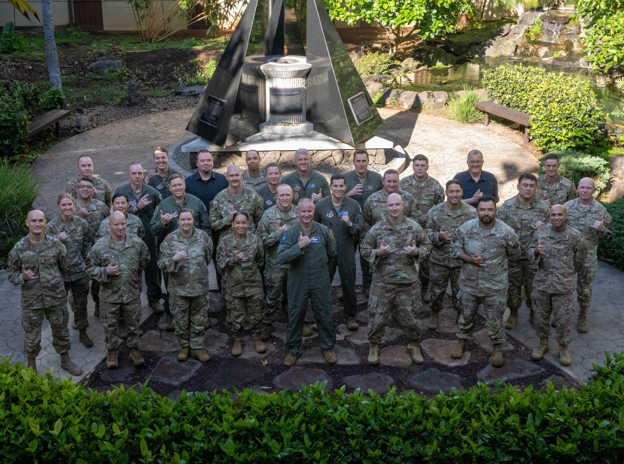 U.S. Air Force Airmen pose for a photo at Pacific Air Forces Headquarters.