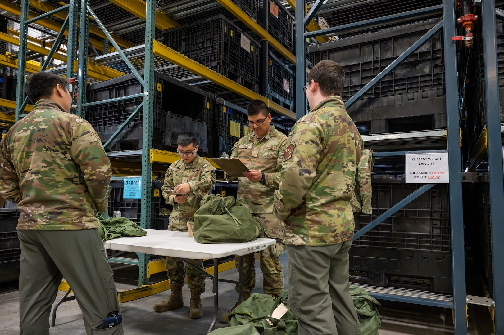 Airmen assigned to the 92nd Logistics Readiness Squadron issue gear to aircrew members during a Nuclear Staff Assistant Visit at Fairchild Air Force Base, Washington, May 19, 2025. The 92nd Air Refueling Wing plays an essential part in enabling Rapid Global Mobility, allowing the Air Force’s warfighting capabilities to sustain its sharpness, agility and lethality. (U.S. Air Force photo by Airman 1st Class Samantha Thorn)