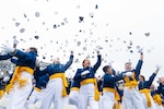 The U.S. Air Force Academy Class of 2025 graduates toss their hats at Falcon Stadium in Colorado Springs, Colo., May 29, 2025. Nine hundred nine cadets received their commissions as second lieutenants in the Air Force and Space Force.