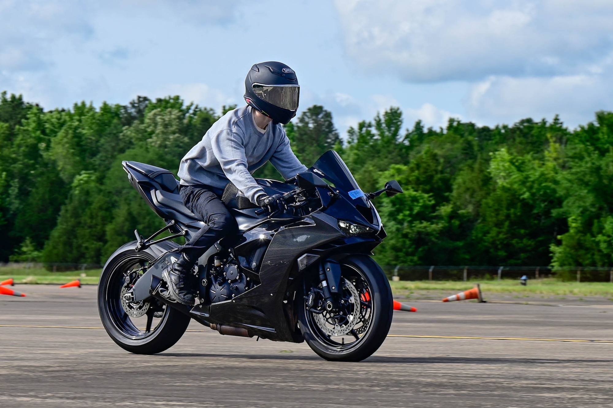 A man riding a motorcycle.