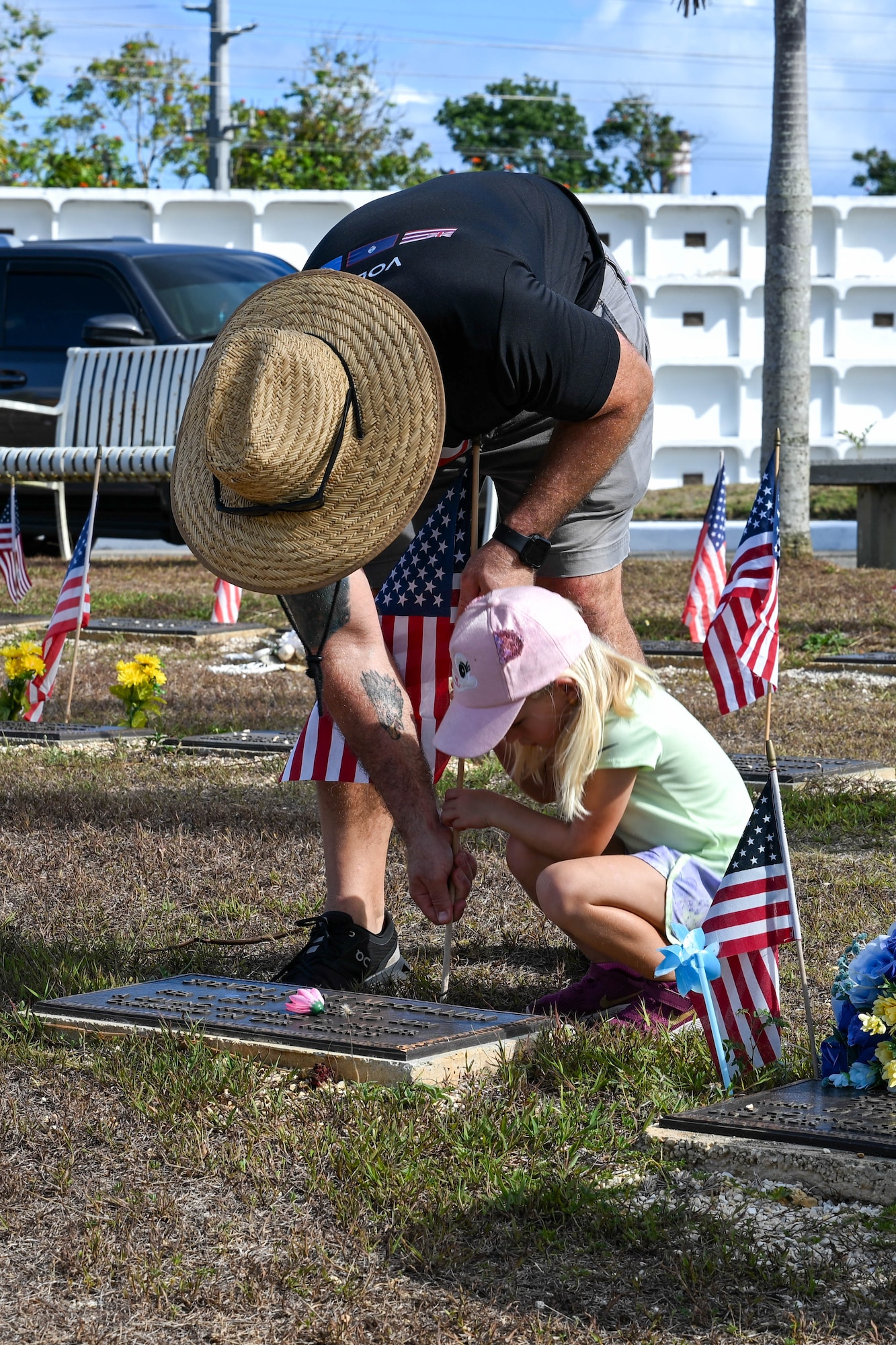 This is the most volunteers for the Memorial Day flag planting the cemetery has seen. (U.S. Air Force photo by Senior Airman Audree Campbell)