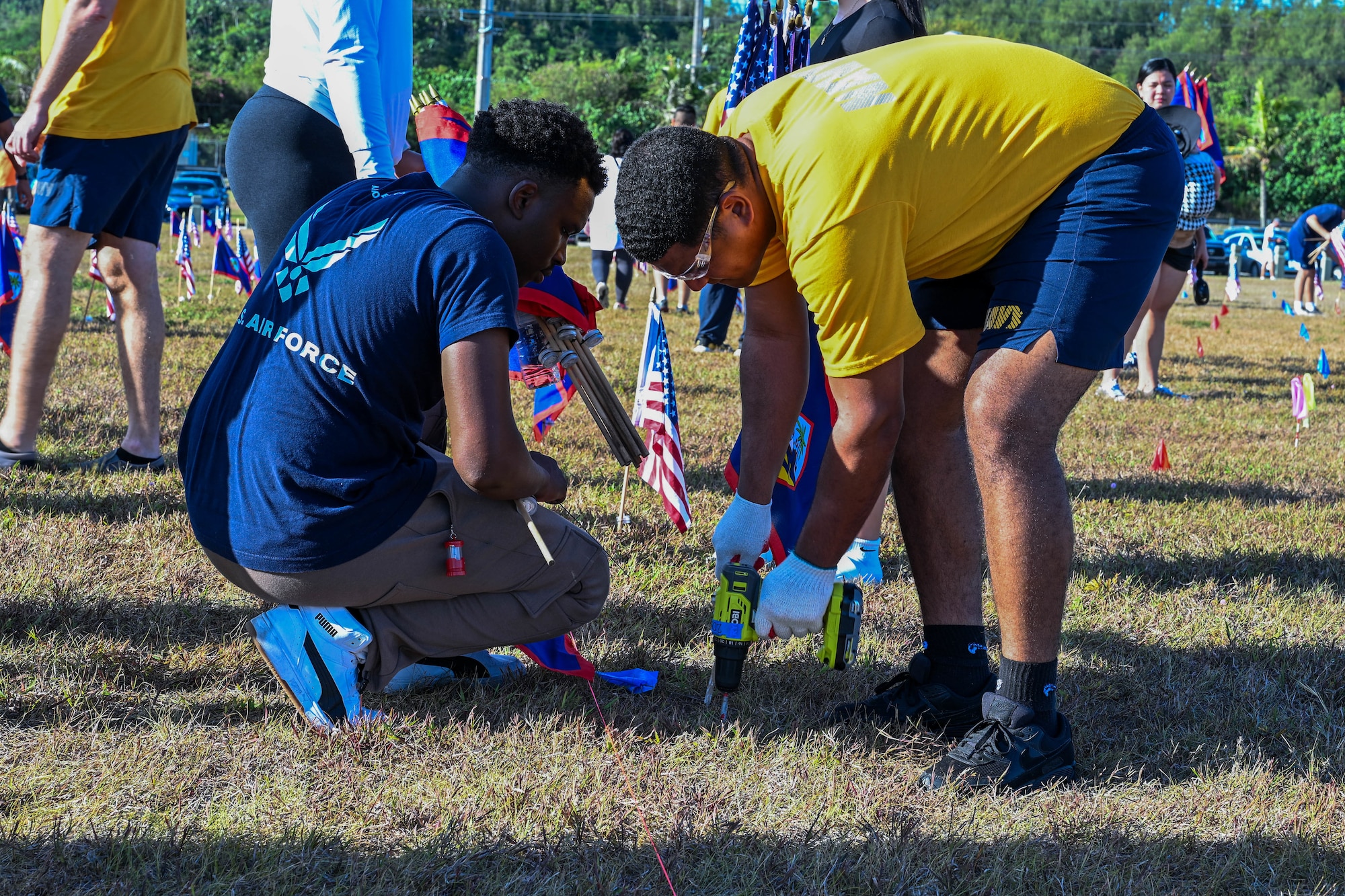 This is the most volunteers for the Memorial Day flag planting the cemetery has seen. (U.S. Air Force photo by Senior Airman Audree Campbell)