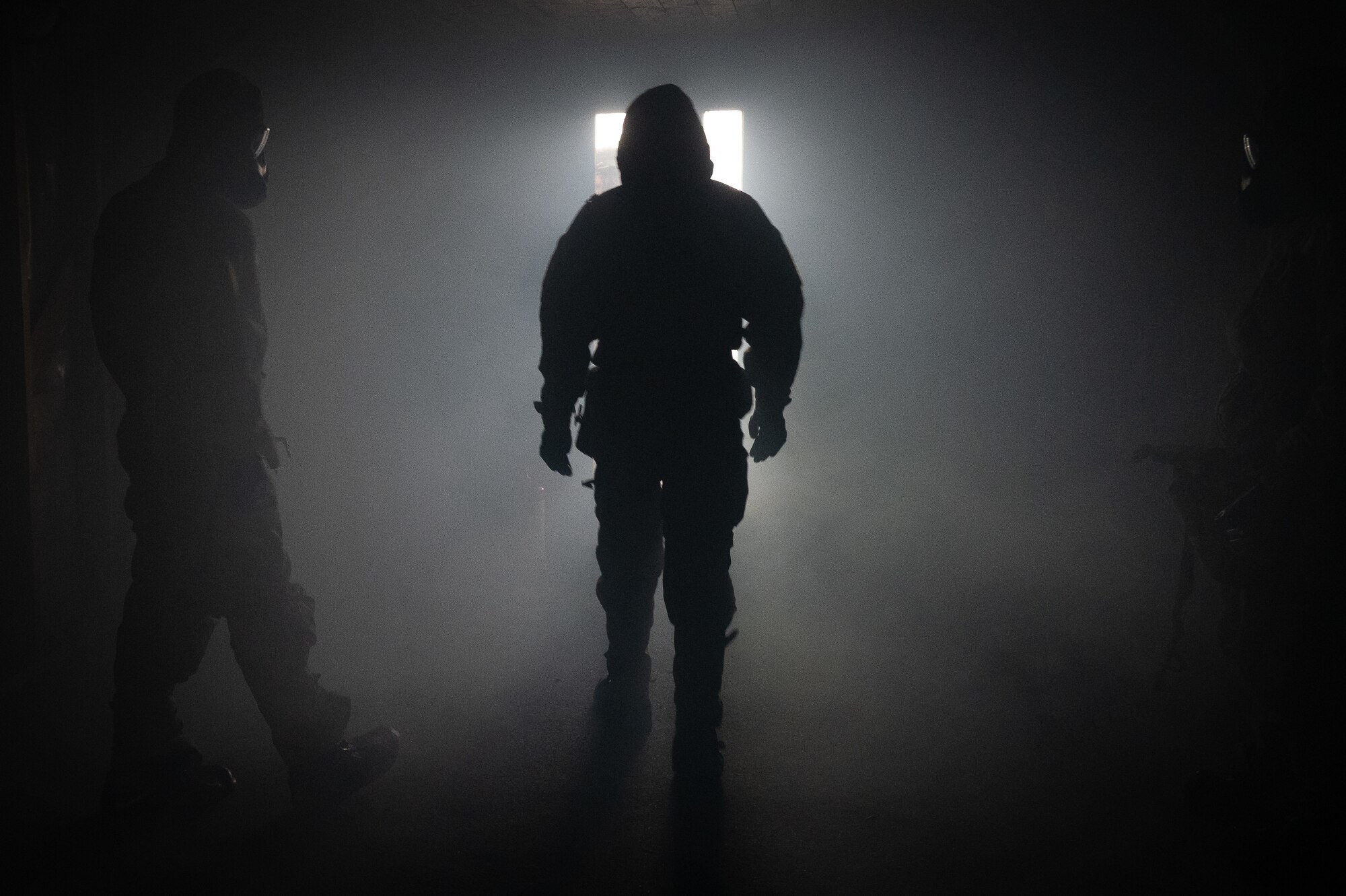 U.S. Airmen from the 426th Air Base Squadron prepare to exit the gas chamber following tear gas exposure during Chemical, Biological, Radiological and Nuclear (CBRN) training