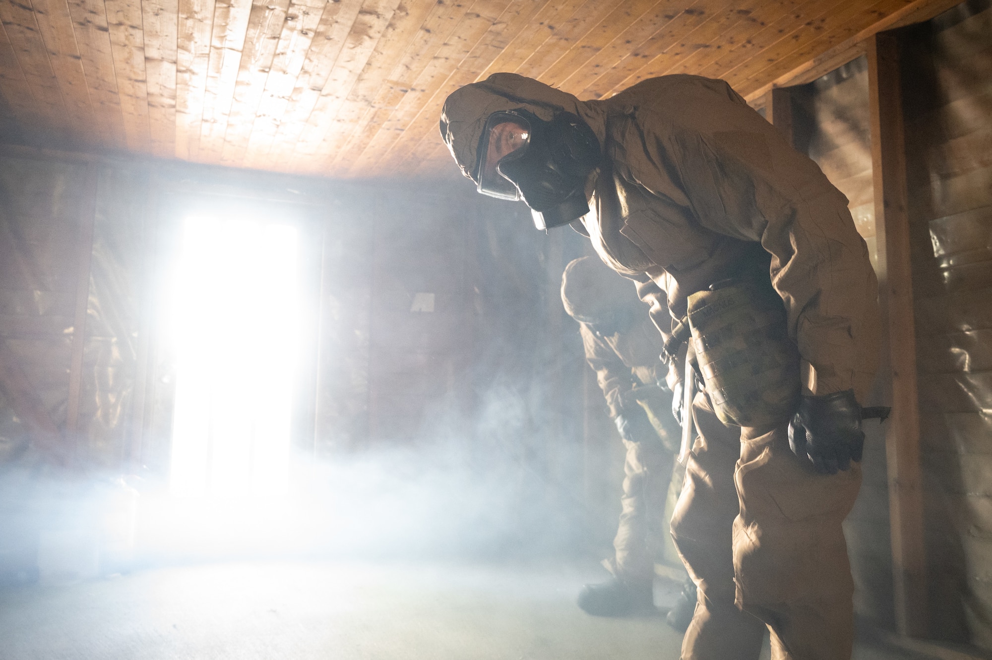 A U.S. Airman from the 426th Air Base Squadron wears a protective mask