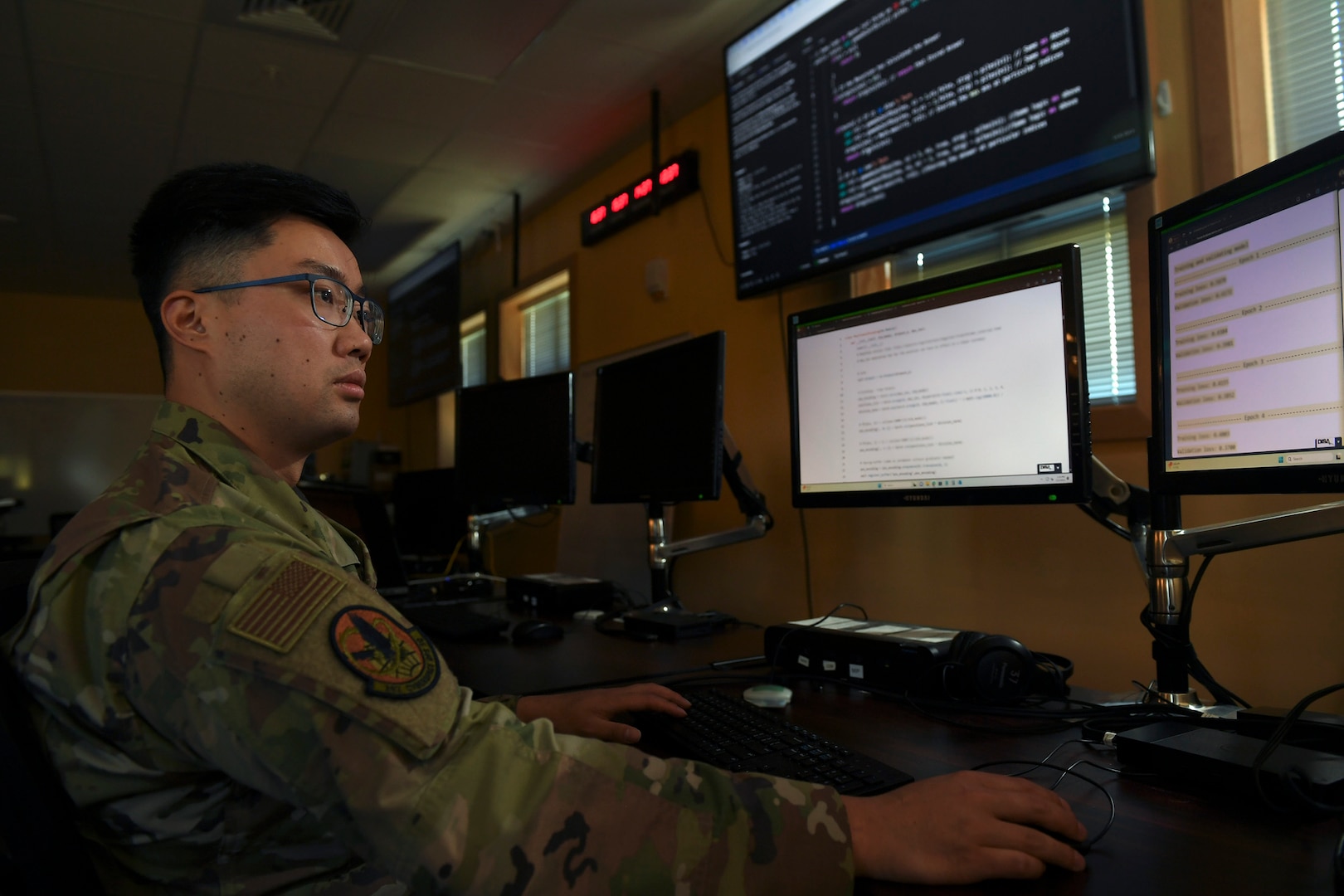 U.S. Air Force Capt. Isaac Tian, a cyber operations officer with the 262nd Cyber Operations Squadron, Washington Air National Guard, analyzes data for evidence of adversary indicators of compromise on Joint Base Lewis-McChord, Wash., April 6, 2025.