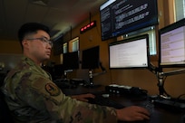 U.S. Air Force Capt. Isaac Tian, a cyber operations officer with the 262nd Cyber Operations Squadron, Washington Air National Guard, analyzes data for evidence of adversary indicators of compromise on Joint Base Lewis-McChord, Wash., April 6, 2025.