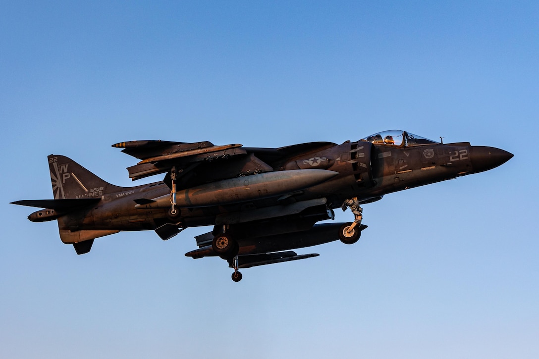 A U.S. Marine Corps AV-8B Harrier with Marine Medium Tiltrotor Squadron 263 (Reinforced), 22nd Marine Expeditionary Unit, flies over head during flight operations aboard the Wasp-class amphibious assault ship USS Iwo Jima (LHD 7), in support of Iwo Jima Amphibious Ready Group Marine Expeditionary Unit Exercise while underway in the Atlantic Ocean, May 23, 2025. During ARGMEUEX, the 22nd MEU, aboard IWO ARG shipping, conducts various mission essential tasks that enhance operational readiness and lethality as a unified IWOARG/22 MEU team. (U.S. Marine Corps photo by Cpl. Emily Hazelbaker)