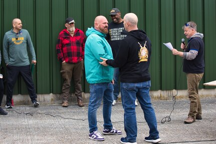 A team member is recognized by the Army Field Support Battalion-Benelux commander, Lt. Col. George Horne, at the AFSBn-Benelux hosted organizational day at the Zutendaal Army Prepositioned Stocks-2 worksite in Belgium May 22. (Photo by George Bellon)