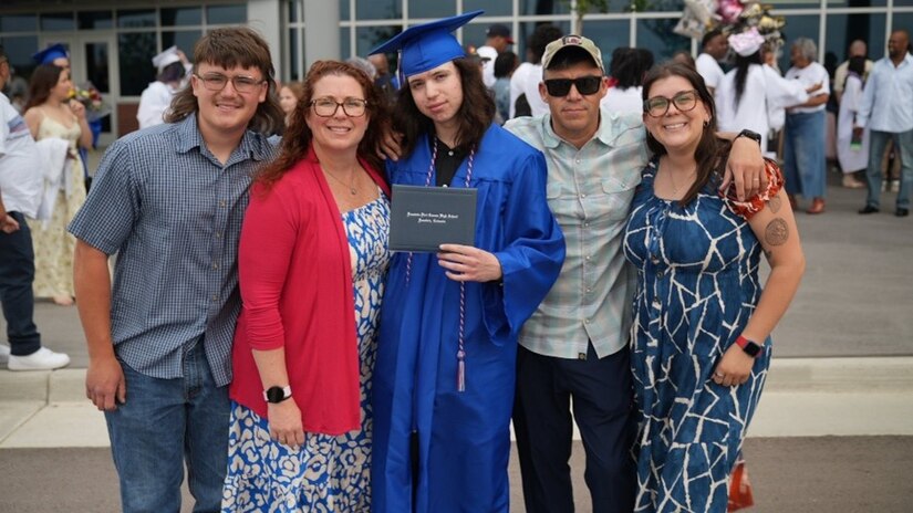 Sgt. 1st Class Alberto Alvarez and his family attending a family member's graduation.