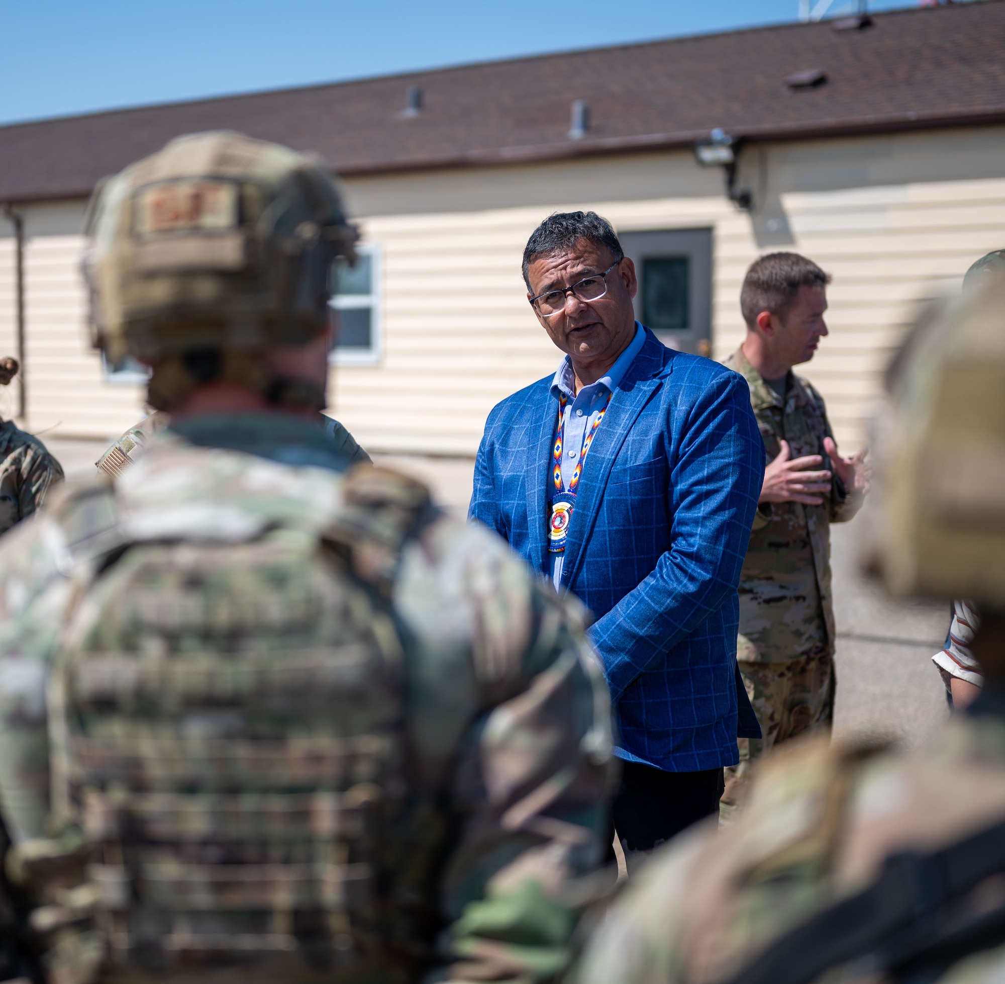Mark Fox, chairman of the Mandan, Hidatsa and Arikara Nation, listens to Defenders from the 91st Missile Wing describe their mission while attending a tour of Missile Alert Facility (MAF) H-01 at Minot Air Force Base, North Dakota May 27, 2025. The tour included conversations on the unique challenges and responsibilities of Airmen stationed at MAFs. (U.S. Air Force photo by Airman 1st Class Luis Gomez)
