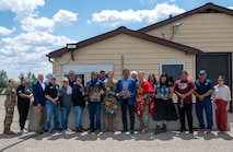 Members of the Mandan, Hidatsa and Arikara (MHA) Nation and 91st Missile Wing (MW) personnel pose for a group photo following a gift exchange at Missile Alert Facility H-01, at Minot Air Force Base, North Dakota, May 27, 2025. Mark Fox, chairman of the MHA Nation, presented traditional gifts to 91MW leadership as part of a cultural engagement to honor partnerships between Native American communities and the Department of Defense. (U.S. Air Force photo by Airman 1st Class Luis Gomez)