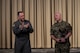 U.S. Air Force Col. Jesse Lamarand, 5th Bomb Wing commander (left), presents the Air Force Global Strike Command large team chaplain corps team of the year award to U.S. Air Force Lt. Col. Ronald Feeser, 5 BW chaplain (right), at Minot Air Force Base, North Dakota, May 28, 2025. Advising leadership on morale, religious, moral, ethical and spiritual issues falls under chaplains’ duties. (U.S. Air Force photo by Senior Airman Alyssa Bankston)