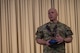 U.S. Air Force Lt. Col. Ronald Feeser, 5th Bomb Wing chaplain, thanks Team Minot’s chaplains after accepting the Air Force Global Strike Command large team chaplain corps team of the year award at Minot Air Force Base, North Dakota, May 28, 2025. Chaplains provide all authorized individuals access to faith opportunities, confidentiality and personal guidance. (U.S. Air Force photo by Senior Airman Alyssa Bankston)