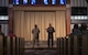 Chief Master Sgt. Wayne Sharp, 5th Bomb Wing (BW) command chief (left), and U.S. Air Force Col. Jesse Lamarand, 5 BW commander (right), address Team Minot’s chaplains, winners of the Air Force Global Strike Command large team chaplain corps team of the year award at Minot Air Force Base, North Dakota, May 28, 2025. Advising leadership on morale, religious, moral, ethical and spiritual issues falls under chaplains’ duties. (U.S. Air Force photo by Senior Airman Alyssa Bankston)