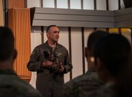 U.S. Air Force Col. Jesse Lamarand, 5th Bomb Wing commander, addresses Team Minot’s chaplains, winners of the Air Force Global Strike Command large team chaplain corps team of the year award at Minot Air Force Base, North Dakota, May 28, 2025. The chaplain corps lines of effort include fortifying warfighter readiness, reimaging chaplain culture and rebuilding chaplain readiness, on which the team award selections are based. (U.S. Air Force photo by Senior Airman Alyssa Bankston)