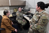 Army Reserve Staff Sgt. Aisha Harper, center, briefs Leigh Anne Alexander, left, director of U.S. Army Medical Logistics Command’s Integrated Logistics Support Center, on her work completed at AMLC as part of U.S. Army Communications-Electronic Command’s Detachment 7 program. DET 7, as it’s commonly known, supports CECOM units with reserve Soldiers who can complete their annual training requirements in functional commands, such as AMLC. Also pictured is Capt. Vanessa Vasquez, another DET 7 Soldier.