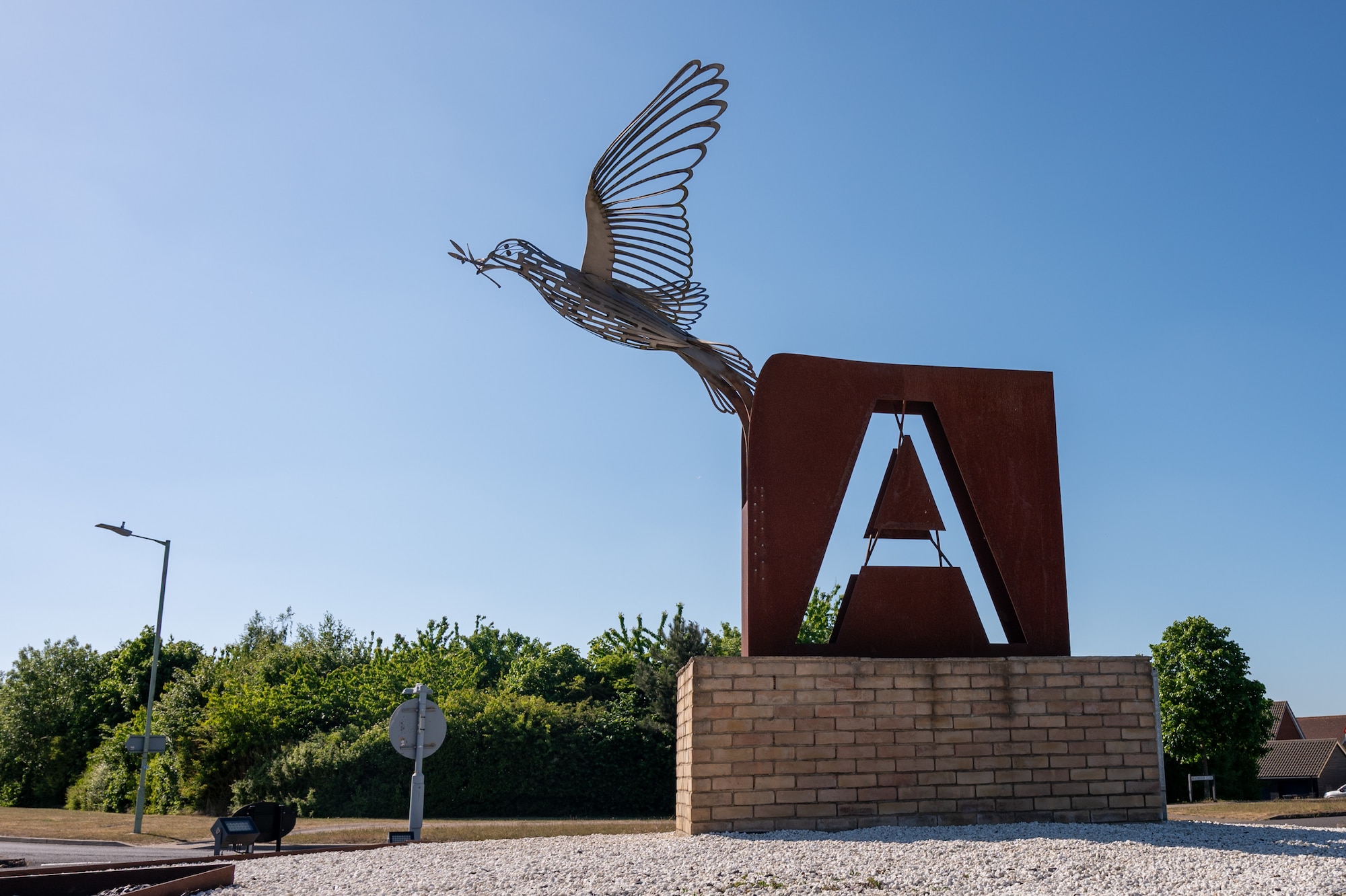 The Flight of Peace sculpture features a flying dove and a Big Square A