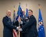 U.S. Air Force Gen. Thomas A. Bussiere, Air Force Global Strike Command commander, (left) presents the Site Activation Task Force (SATAF) Detachment 12 guidon to U.S. Air Force Lt. Col. Nicholas Conover, SATAF Detachment 12 commander, for the detachment’s activation ceremony at Minot Air Force Base, North Dakota, May 21, 2025. The activation of SATAF Det. 12 marks an important step in preparing the base’s infrastructure to support the employment of the next-generation Sentinel Intercontinental Ballistic Missile system. (U.S. Air Force photo by Airman 1st Class Wesley Davies)