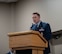 U.S. Air Force Lt. Col. Nicholas Conover, Site Activation Task Force (SATAF) Detachment 12 commander, gives a speech on the newly activated SATAF Detachment 12 at Minot Air Force Base, North Dakota, May 21, 2025. The SATAF Detachments that have been activated are part of a comprehensive modernization program focused on replacing the Minuteman III missiles with new Sentinel missiles. (U.S. Air Force photo by Airman 1st Class Wesley Davies)