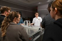 Seniors from George Mason University visited Naval Surface Warfare Center, Carderock Division, to present their senior design projects to Carderock engineers on May 9, 2024. The two teams presented their projects; one team built an environmental chamber for mechanical testing and the other was tasked with fabricating composite panels for ready service lockers that were malleable enough to bend 45 degrees on all four corners and edges. Carderock, the Navy's ship design and innovation powerhouse, provides the technical foundation for the future fleet through world-class research, development, and testing