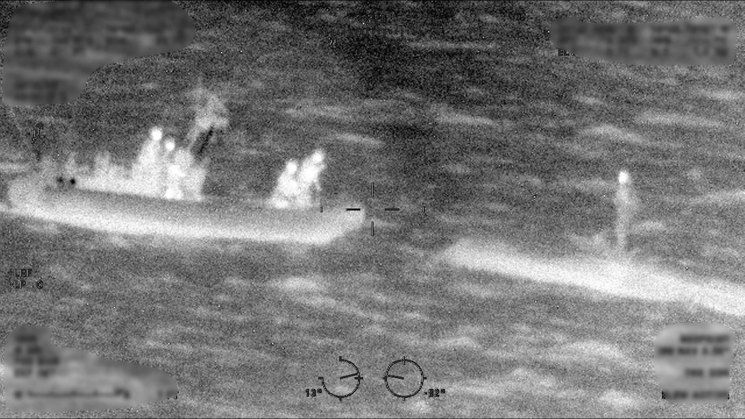 A boat crew from the Coast Guard Cutter Margaret Norvell (WPC-1105) rescuing a mariner approximately eight miles northwest of Freeport, Bahamas, May 30, 2025. A U.S. Coast Guard Air Station Miami HC-144 aircrew assisted with locating the individual. (U.S. Coast Guard photo)