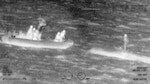 A boat crew from the Coast Guard Cutter Margaret Norvell (WPC-1105) rescuing a mariner approximately eight miles northwest of Freeport, Bahamas, May 30, 2025. A U.S. Coast Guard Air Station Miami HC-144 aircrew assisted with locating the individual. (U.S. Coast Guard photo)