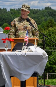 Army colonel talks at podium