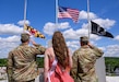 Army Medical Logistics Command’s Command Sgt. Major Gabriel Wright (left) and Commander Col. Marc Welde (right) salute after laying a Memorial Day wreath during a ceremony with Miss Poppy May 25, in Woodsboro, Maryland. 
Photo by Ric Dugan, Used with permission from Frederick News Post.