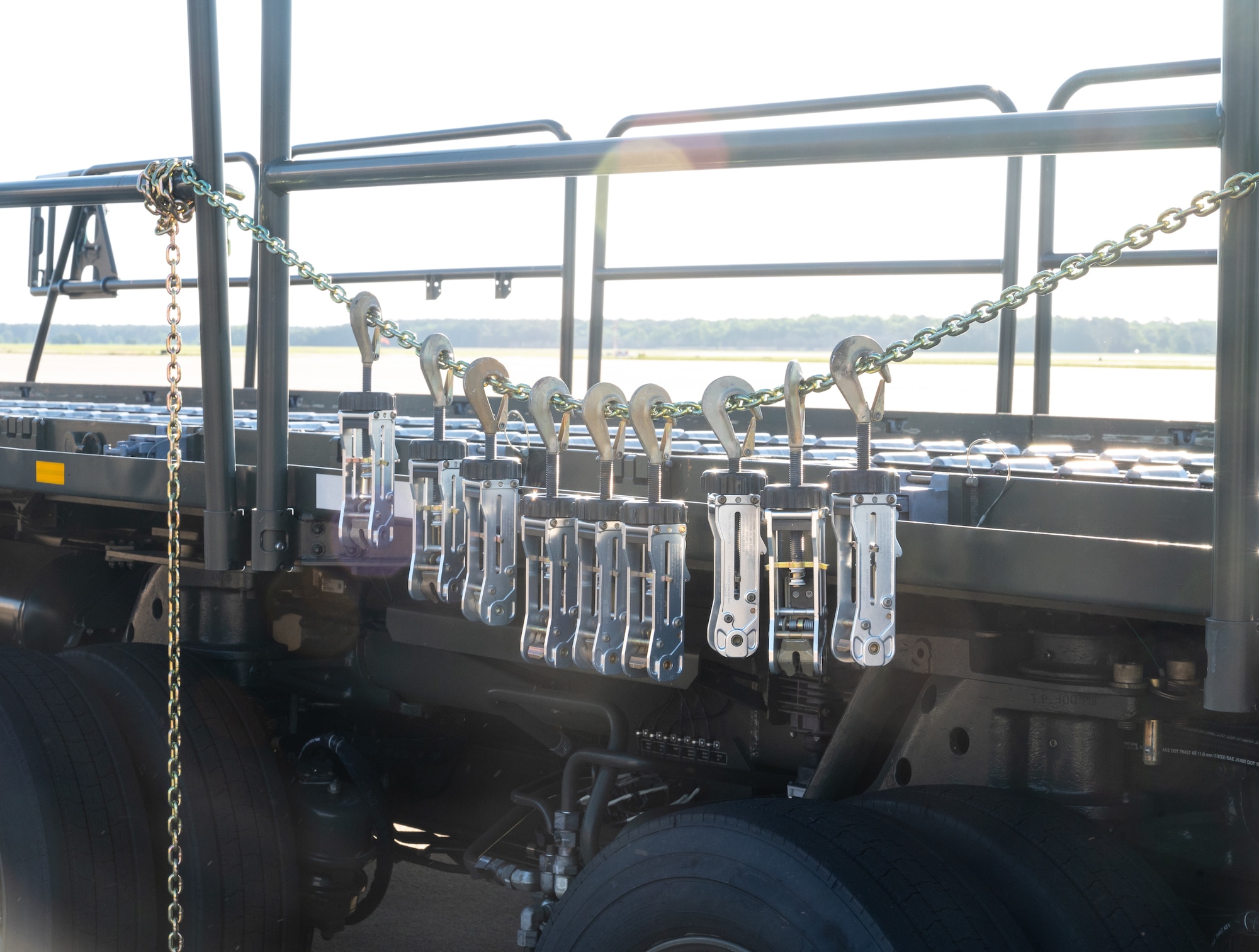 A line of devices hang on a chain.