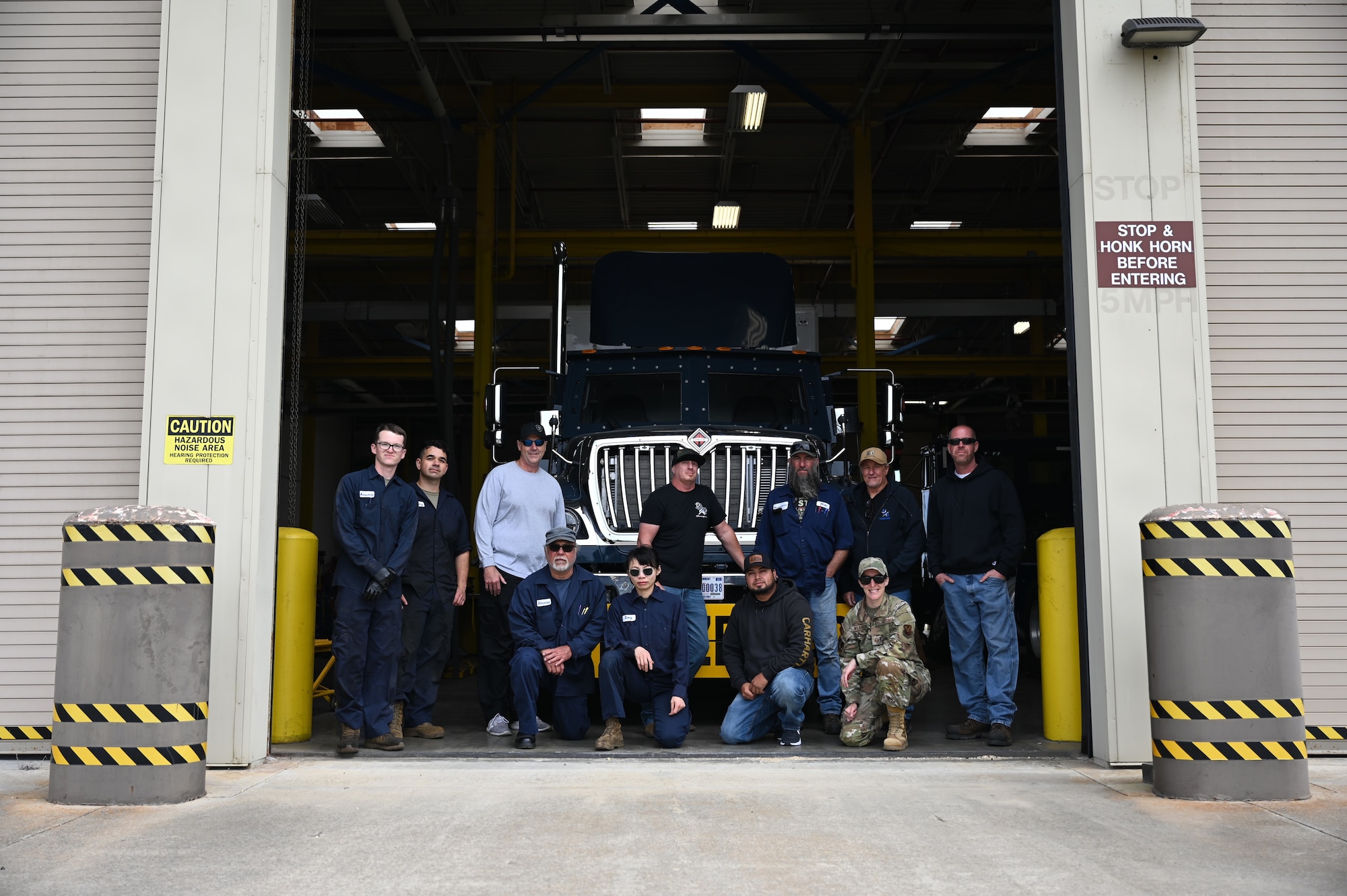 30th Logistic Readiness Squadron members pose for a group photo with the newly arrived Payload transporter Replacement (PTR) at Vandenberg Space Force Base.