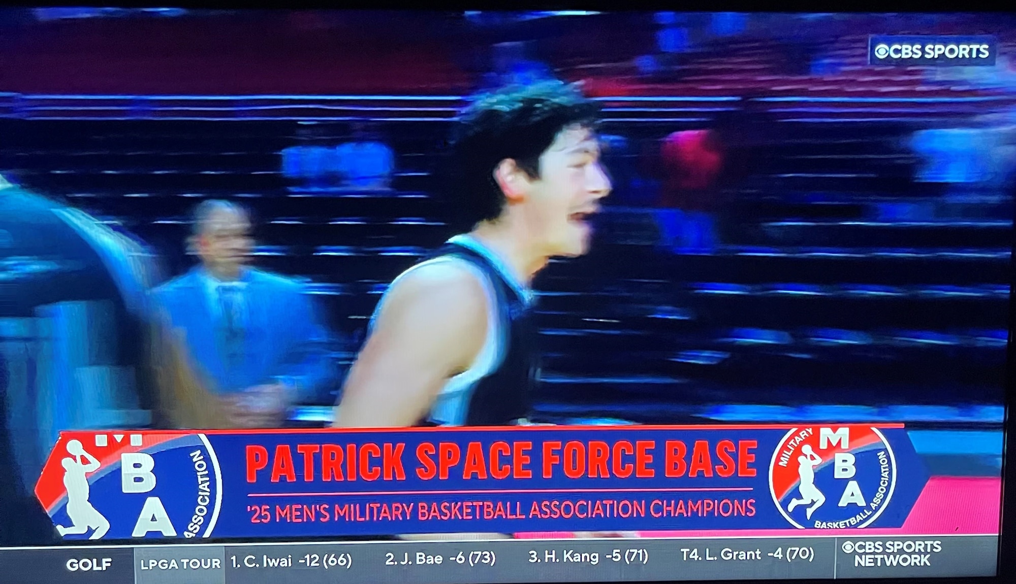 A CBS Sports broadcast highlights Patrick Space Force Base as the 2025 Military Basketball Association Champions on May 25, 2025.