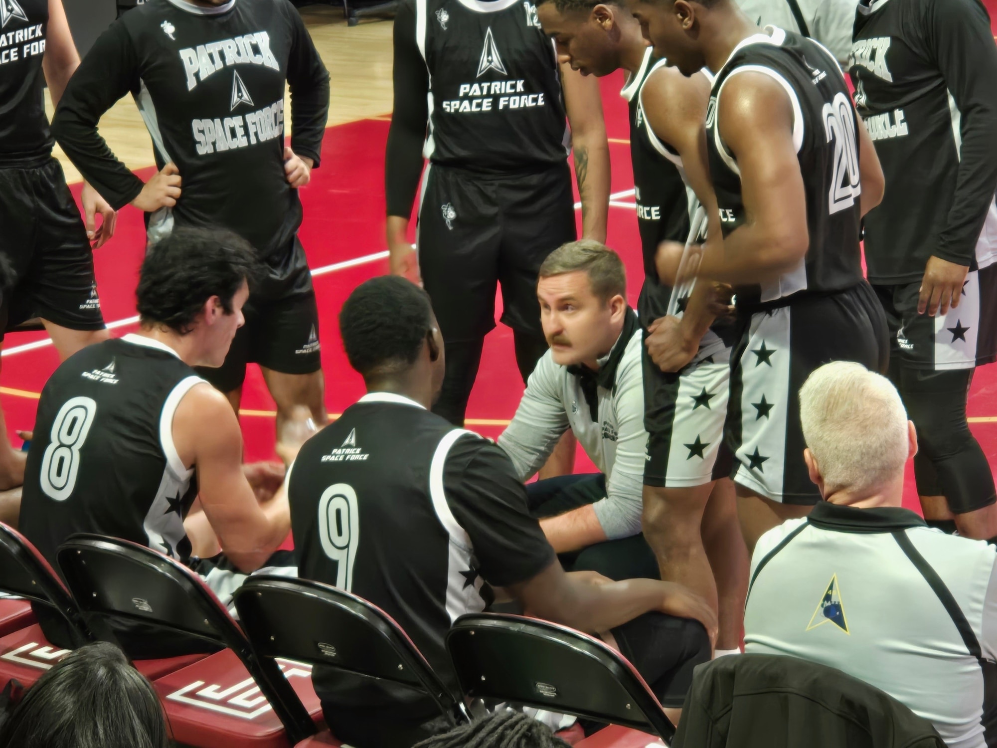 Patrick Space Force Base head coach SSgt Jeffrey Hurst delivers strategic guidance during a timeout against Fort Bliss in the 2025 Military Basketball Association Championship hosted in Philadelphia, Pennsylvania on May 25, 2025. The team, made up of Guardians, Airmen, and civilians, secured the title with an 87-78 win.