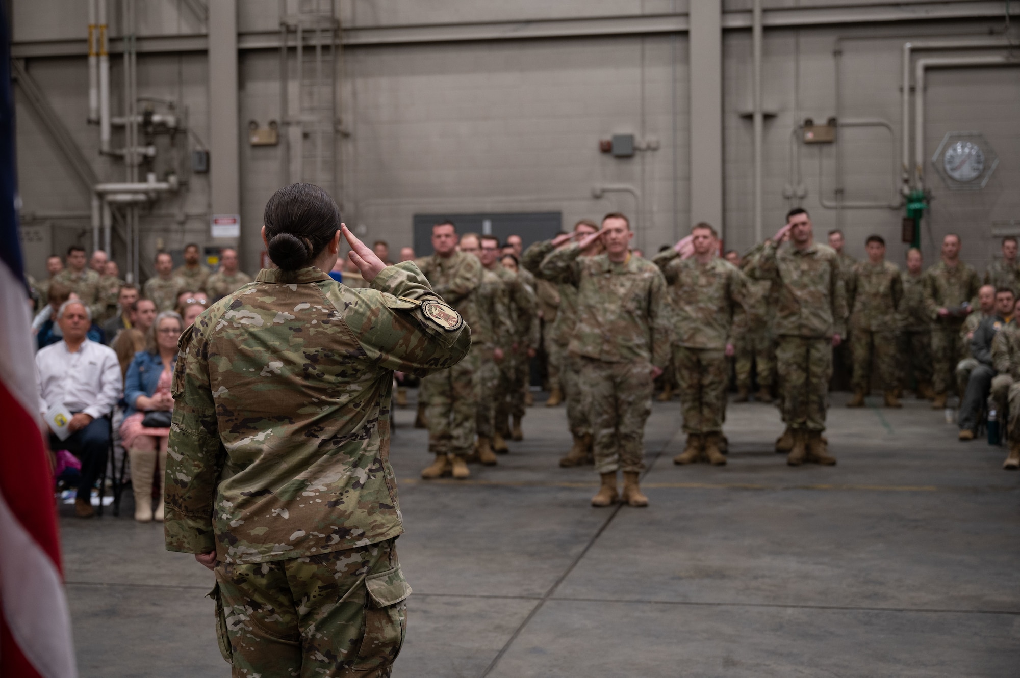 U.S. Air Force Maj. Renee Bohac, 18th Fighter Generation Squadron incoming commander, renders an initial salute to the formation during a change of command ceremony at Eielson Air Force Base, Alaska, May 30, 2025.