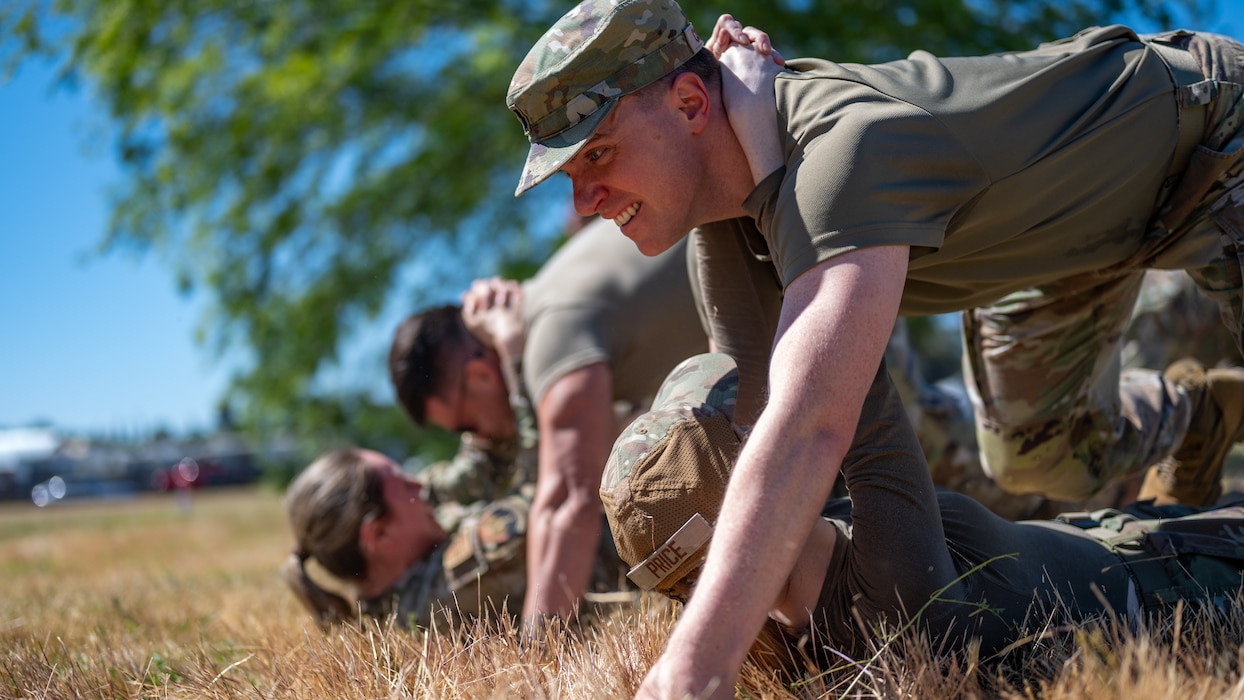 Airmen perform a medical bear crawl drag