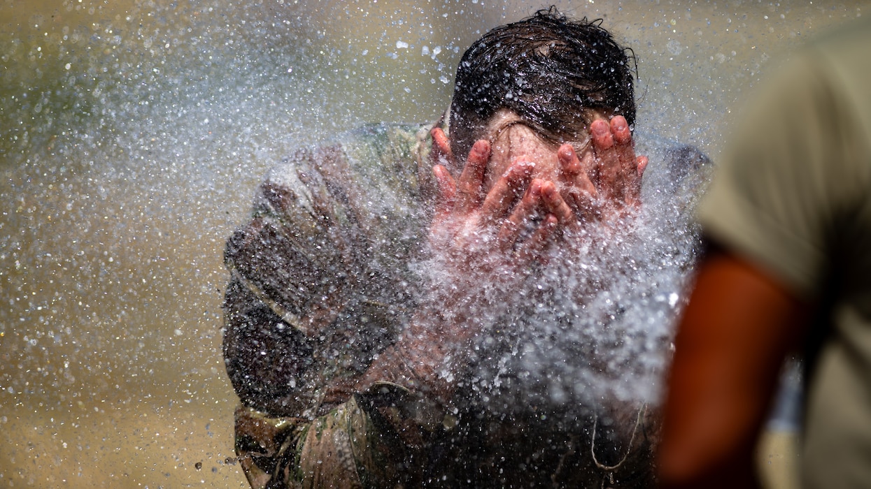 Airmen gets sprayed with water