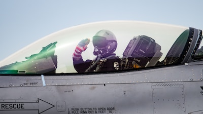 MISAWA, AOMORI, Japan (May 30, 2025) — U.S. Air Force Capt. Ethan “Bantam” Smith, Pacific Air Forces F-16 Demonstration Team commander, salutes his crew chief as he taxis out in an F-16 Fighting Falcon during the team’s final flight at Misawa Air...
